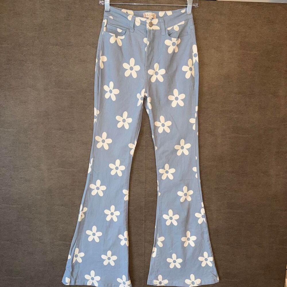 Altar’d State white & blue floral flare pants with white flowers on light blue